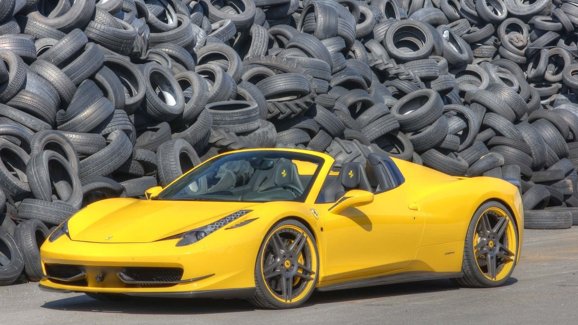 Ferrari 458 Spider, bright yellow, towering pile of discarded black tires, Full HD Desktop Wallpaper