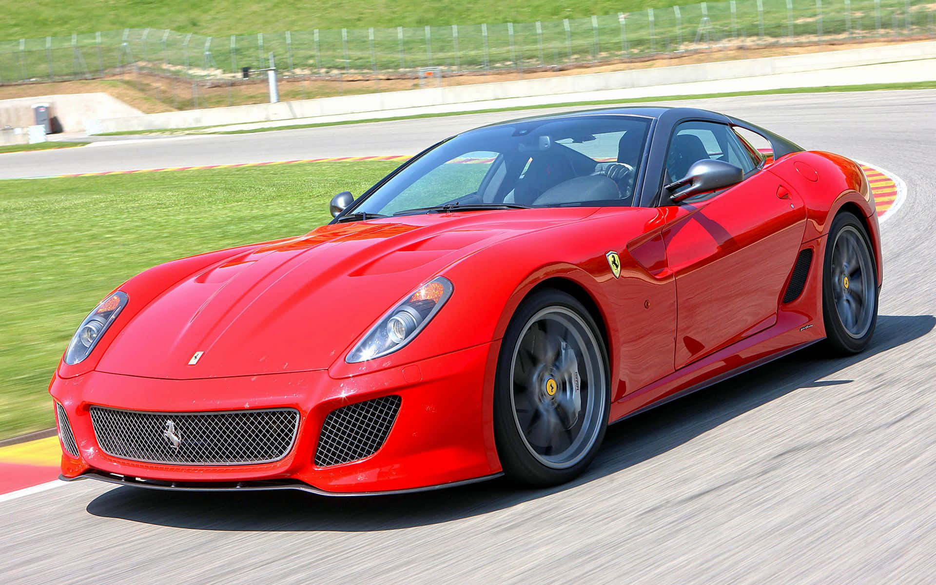 Ferrari 599 GTB Fiorano, vibrant red, racetrack corner, Full HD Desktop Wallpaper