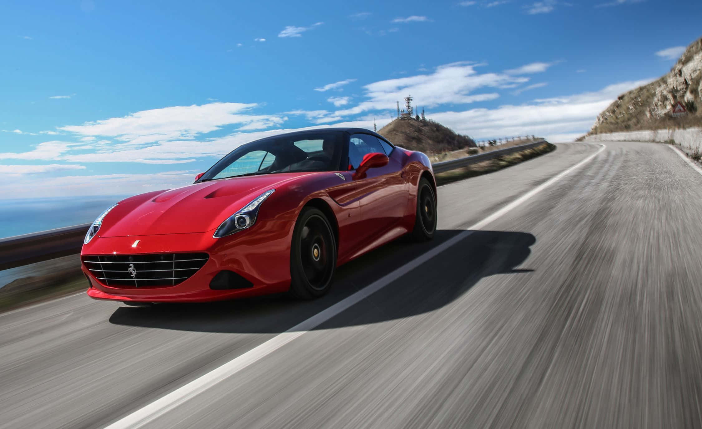 Ferrari California T, vibrant red, coastal mountain road, Full HD Desktop Wallpaper
