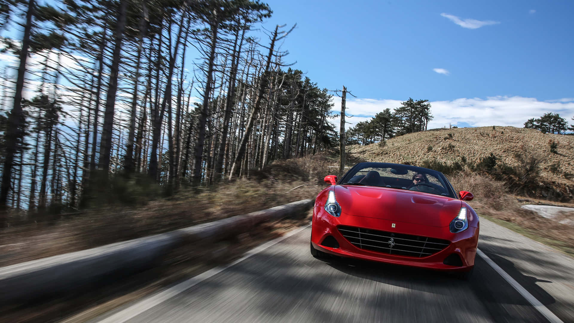 Ferrari California T, vibrant red, winding forest road, Full HD Desktop Wallpaper