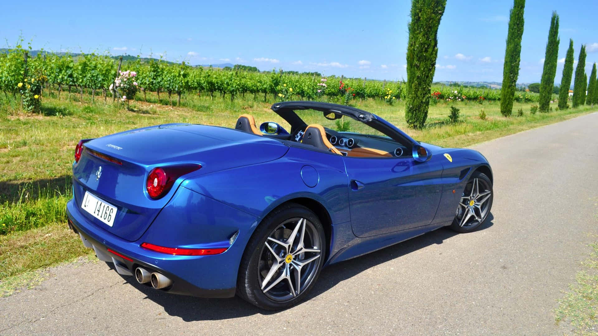 Ferrari California T, glossy blue, sunlit country road, Full HD Desktop Wallpaper
