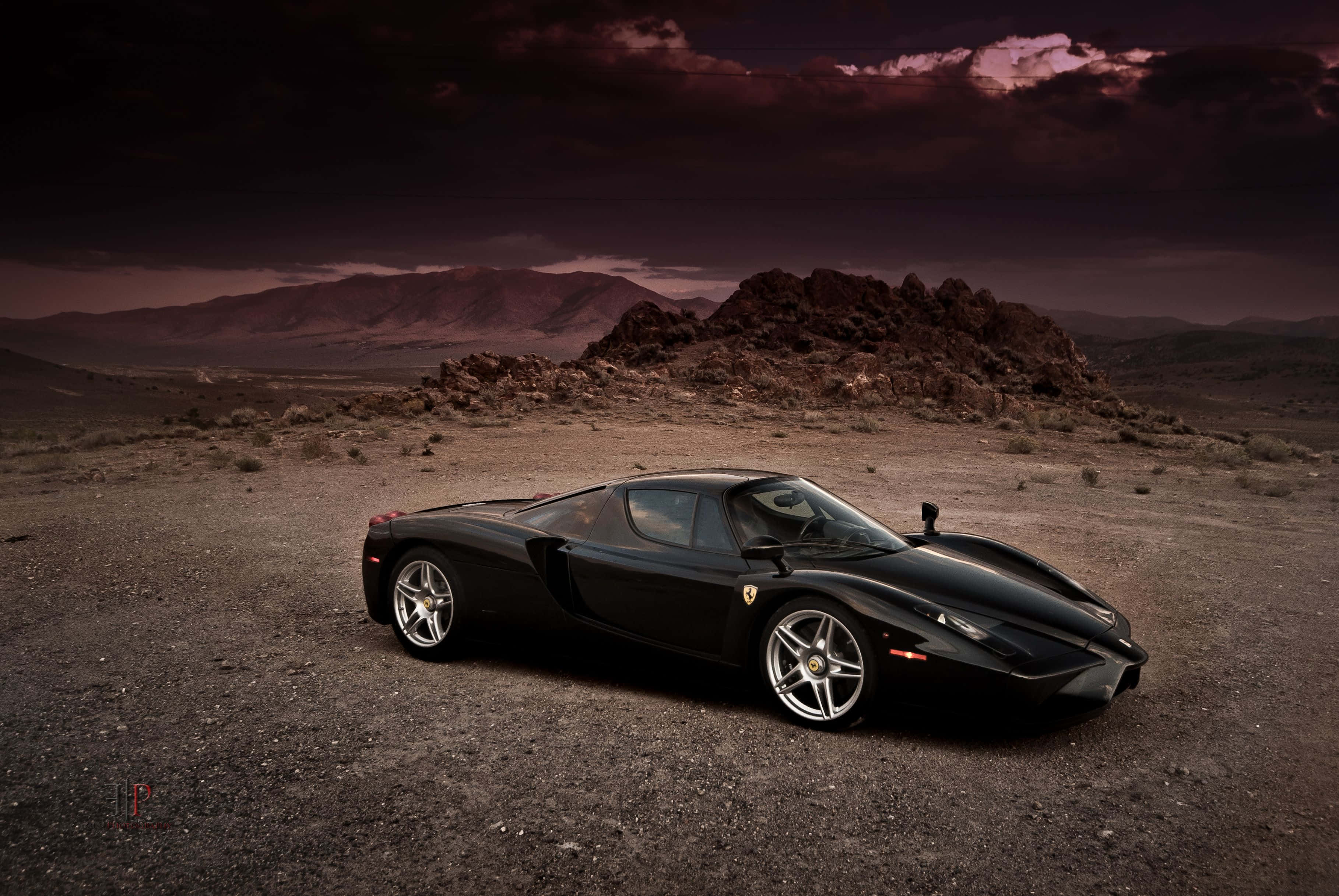 Ferrari Enzo, black, desert landscape, 2K Desktop Wallpaper
