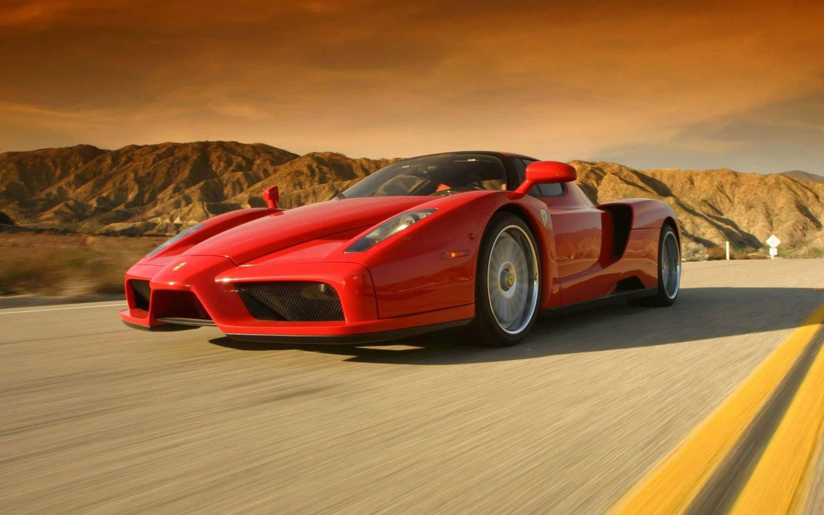 Ferrari Enzo, vibrant red, desert highway, 2K Desktop Wallpaper