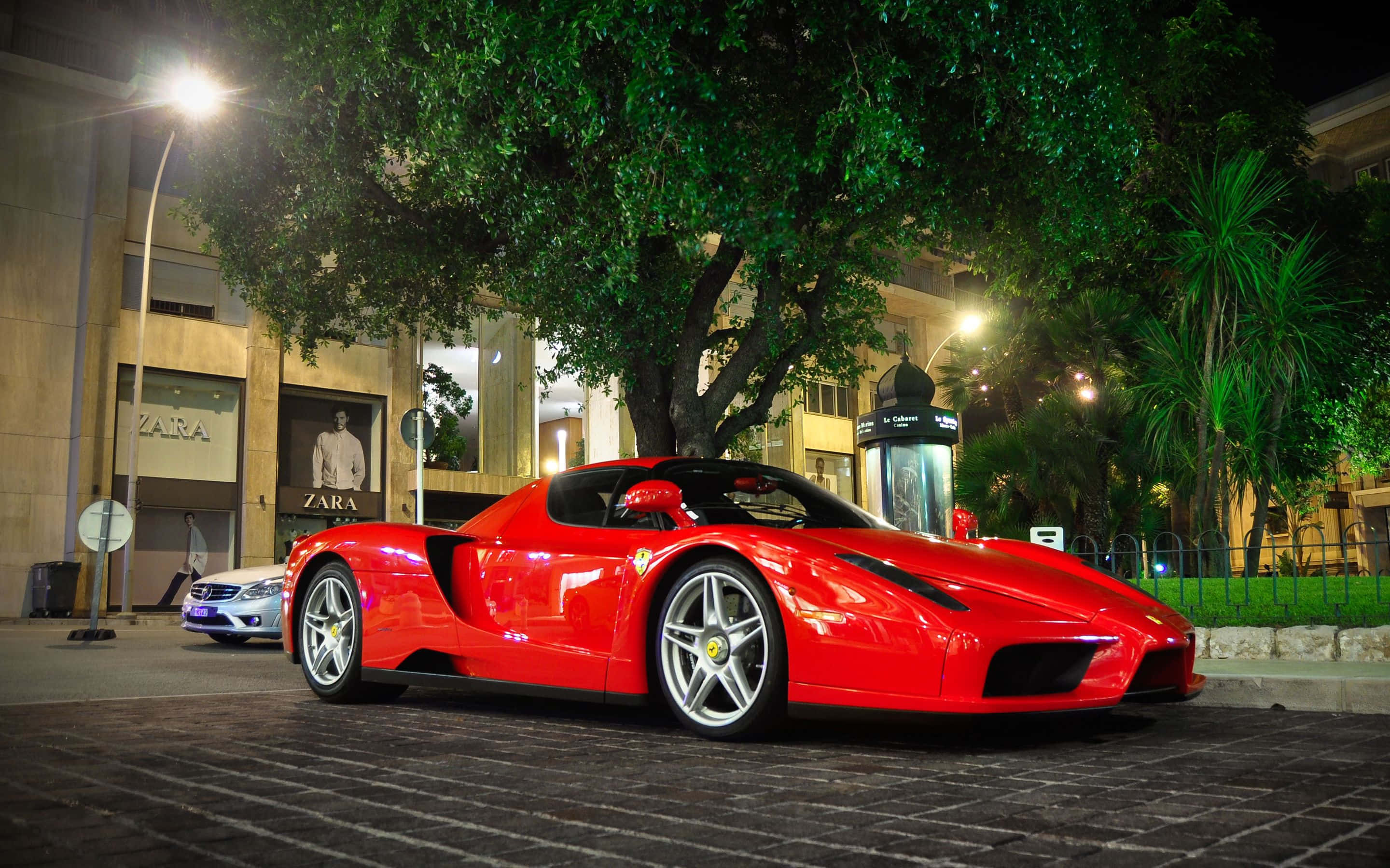 Ferrari Enzo, glossy red, cobblestone street, 2K Desktop Wallpaper