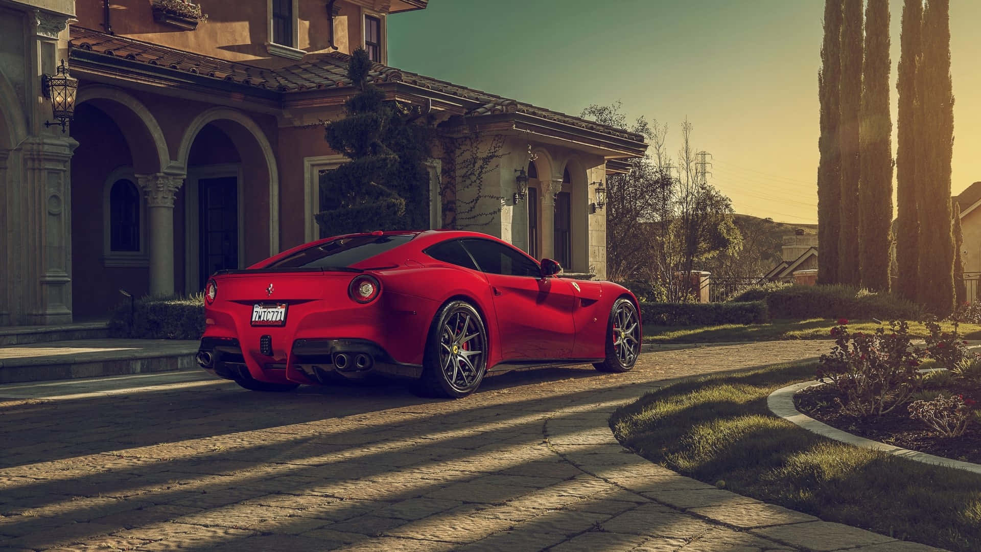 Ferrari F12 Berlinetta, vibrant red, sunlit cobblestone driveway, Full HD Desktop Wallpaper