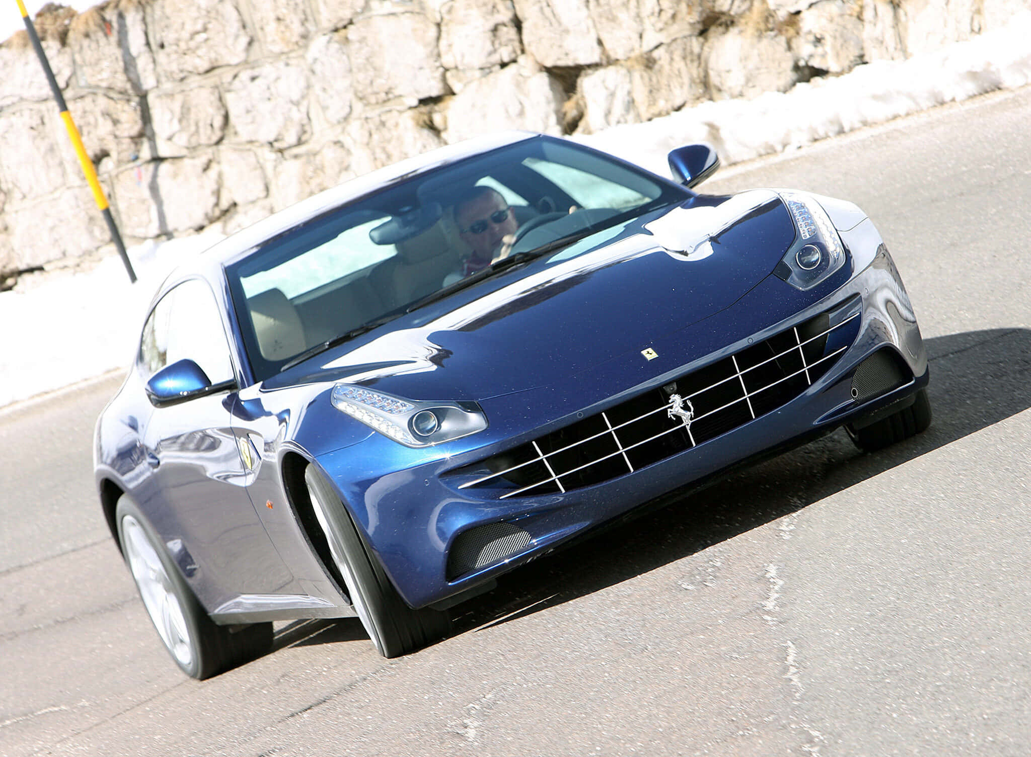 Ferrari FF, sleek blue, sunlit mountain road, Full HD Desktop Wallpaper