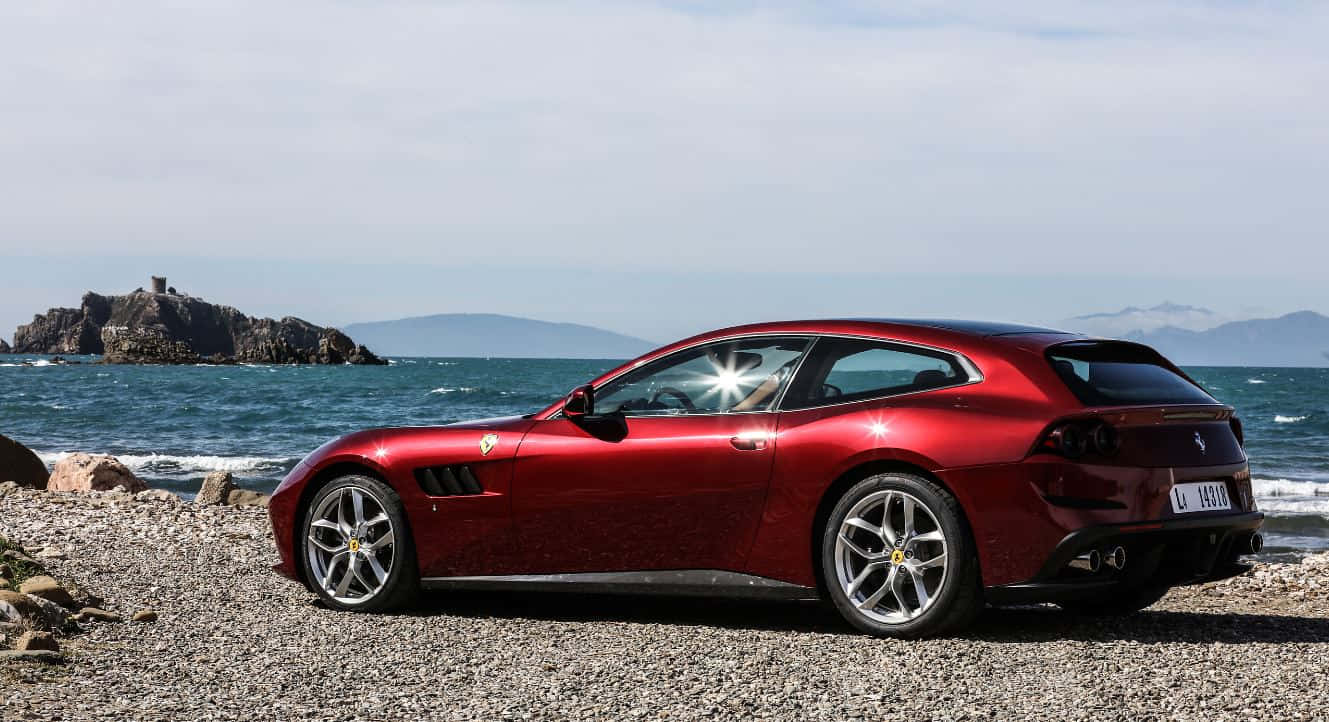 Ferrari GTC4Lusso, glossy red, rocky beach, HD Desktop Wallpaper