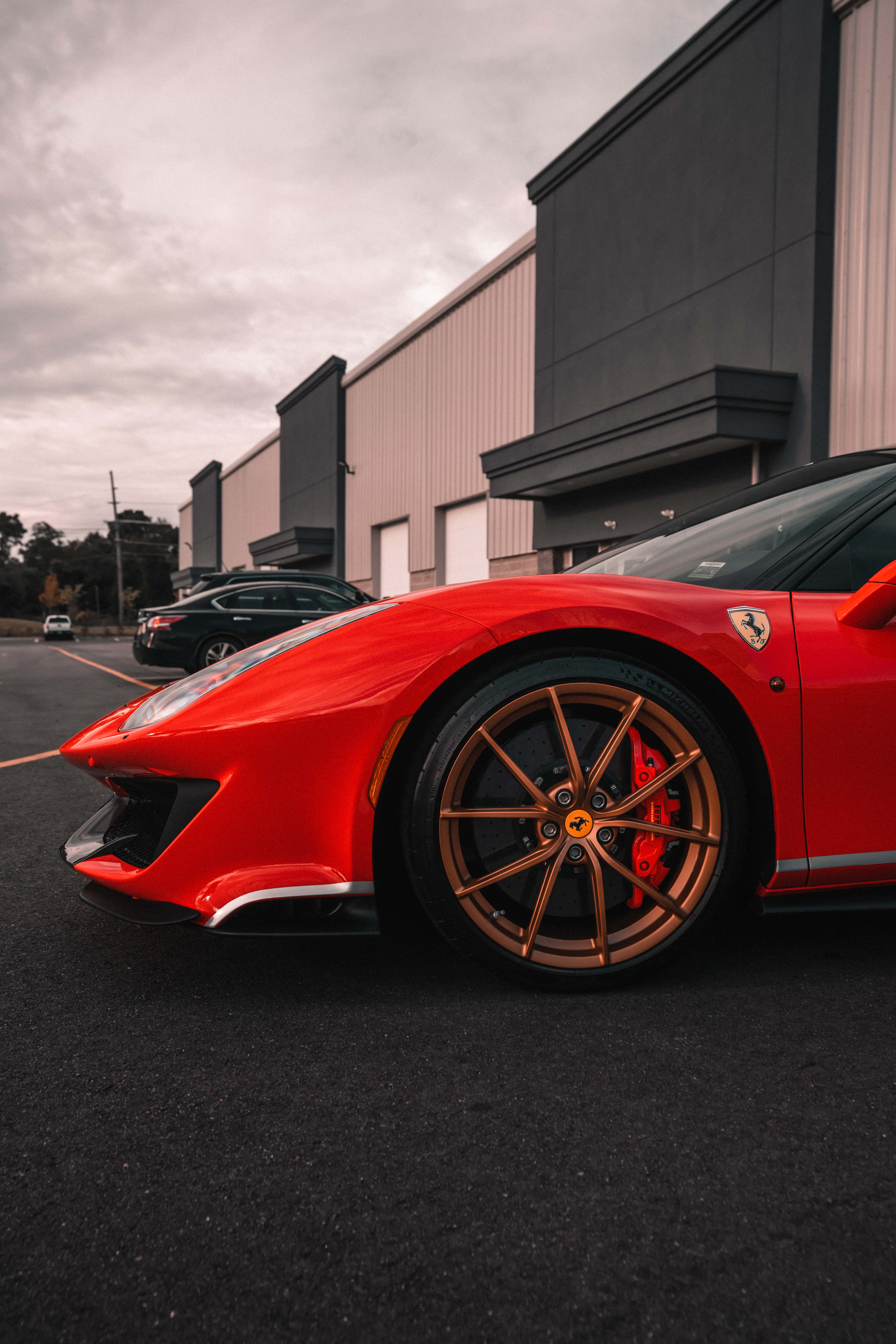 Ferrari iPhone X, vibrant red, gold rims, 5K Phone Wallpaper
