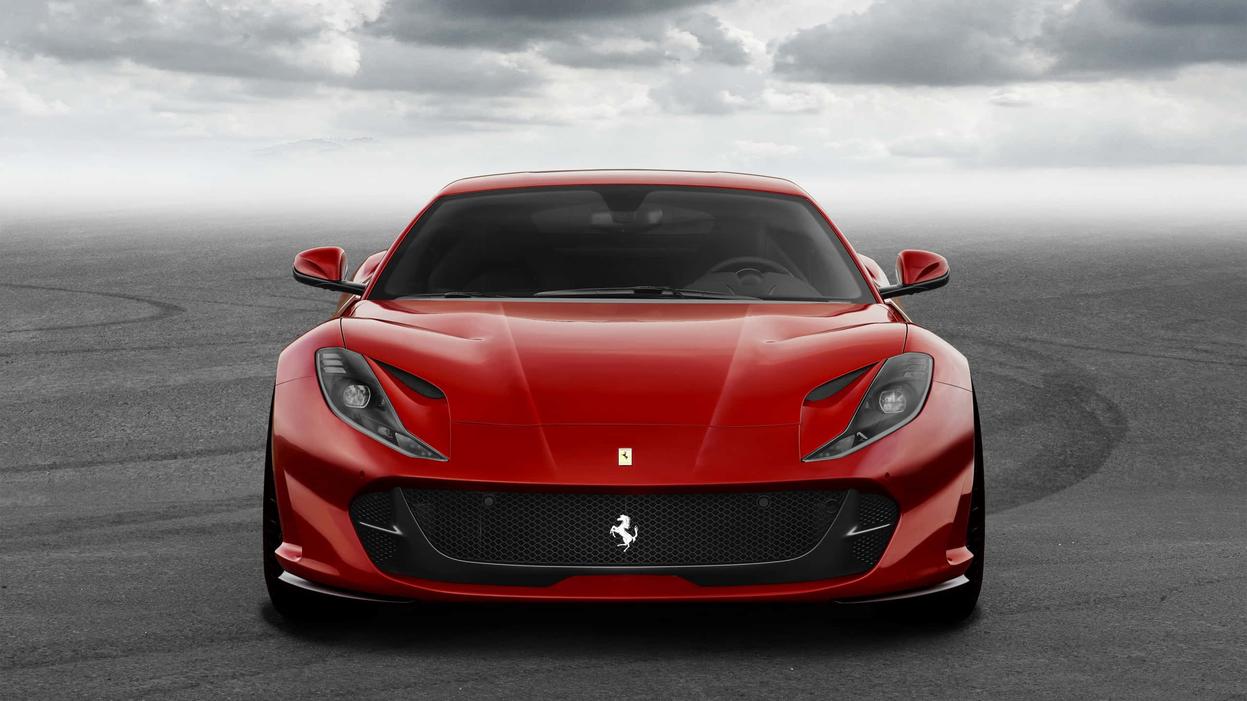 Ferrari Portofino, vibrant red, gray asphalt track, 2K Desktop Wallpaper