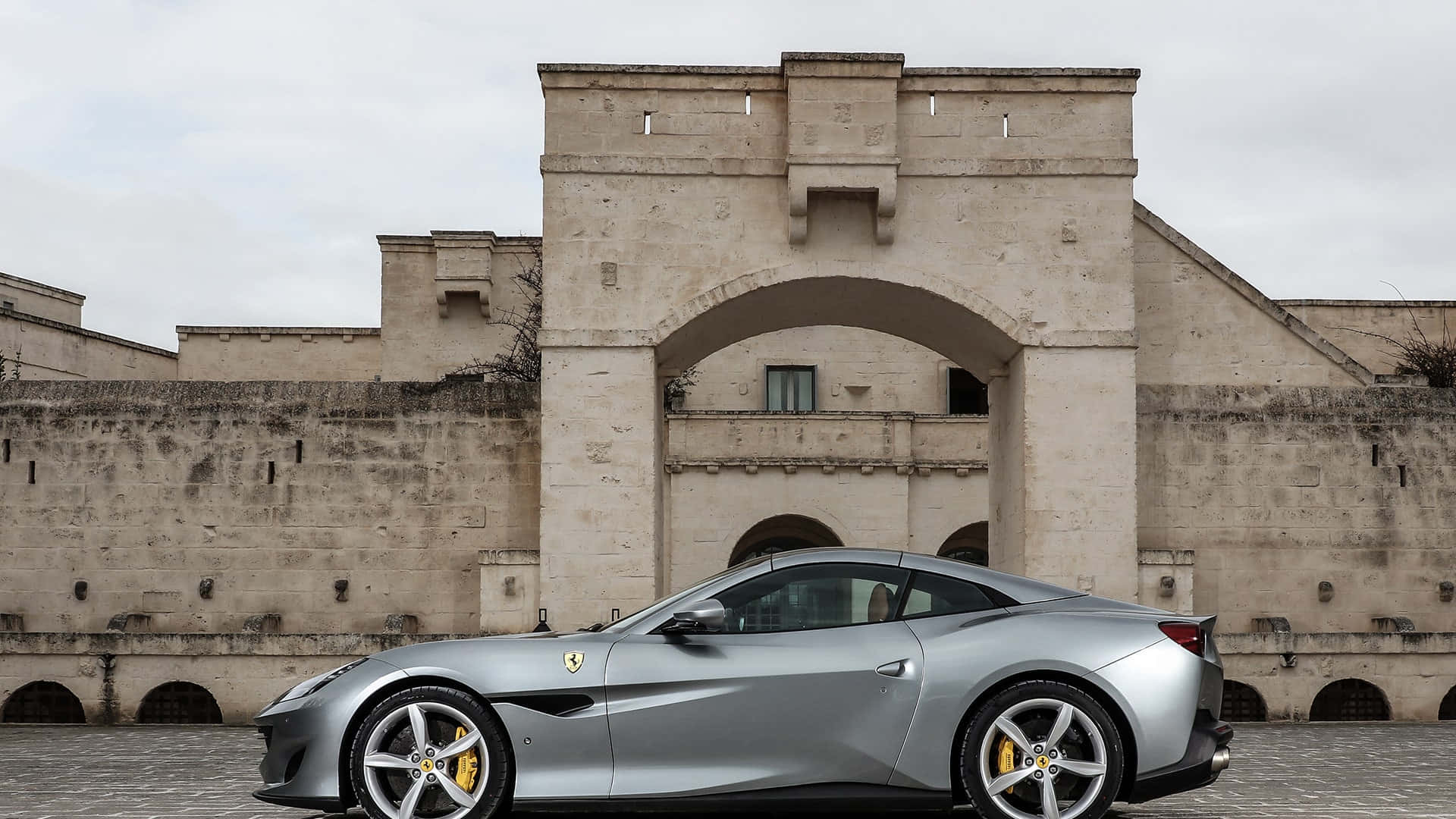 Ferrari Portofino, sleek silver, historic stone fortress, Full HD Desktop Wallpaper