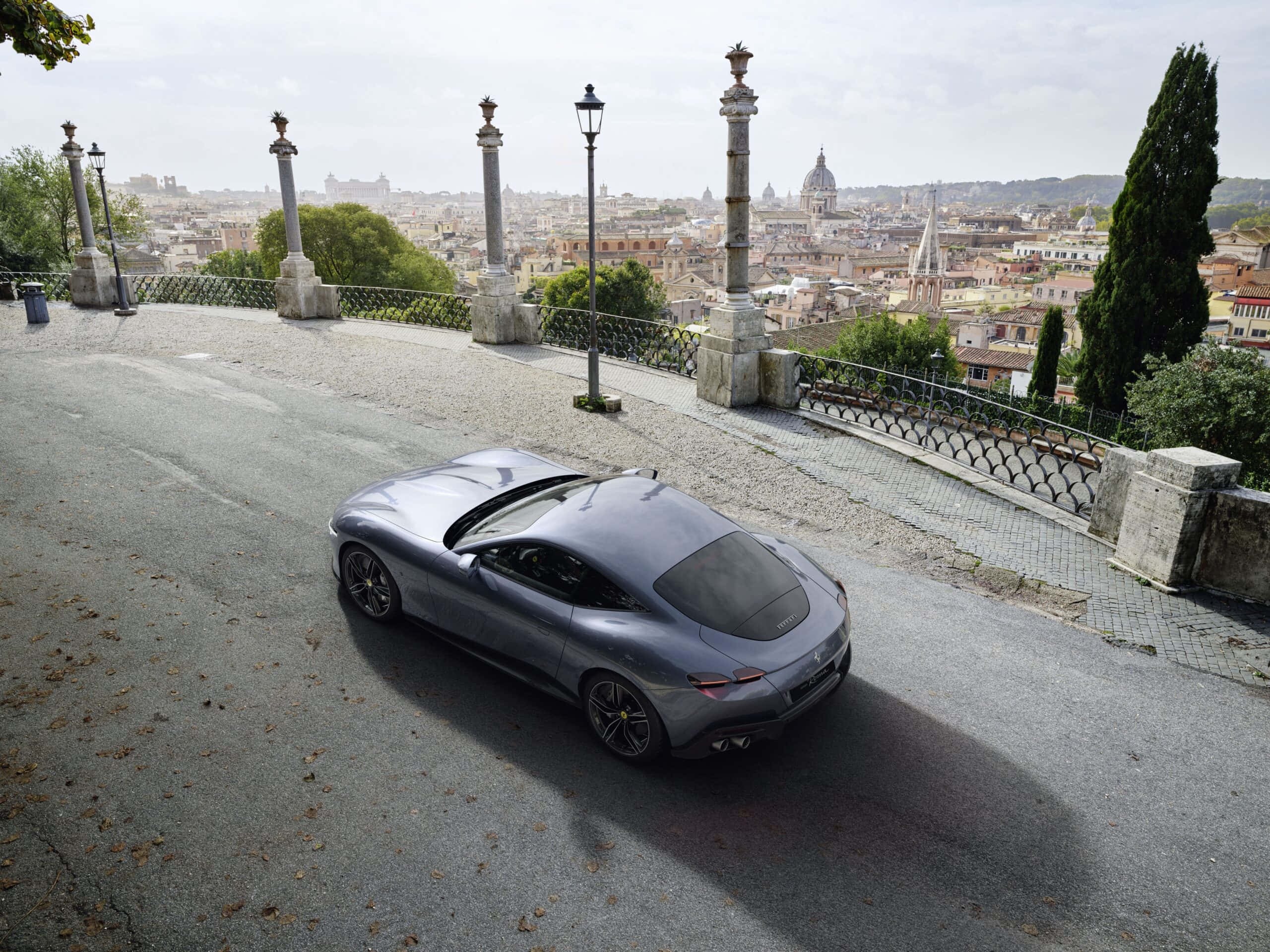 Ferrari Roma, silver, cobblestone hillside, 2K Desktop Wallpaper
