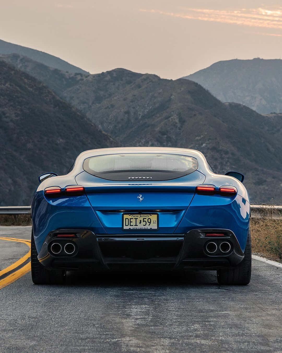 Ferrari Roma, vibrant blue, winding mountain road, HD Phone Wallpaper