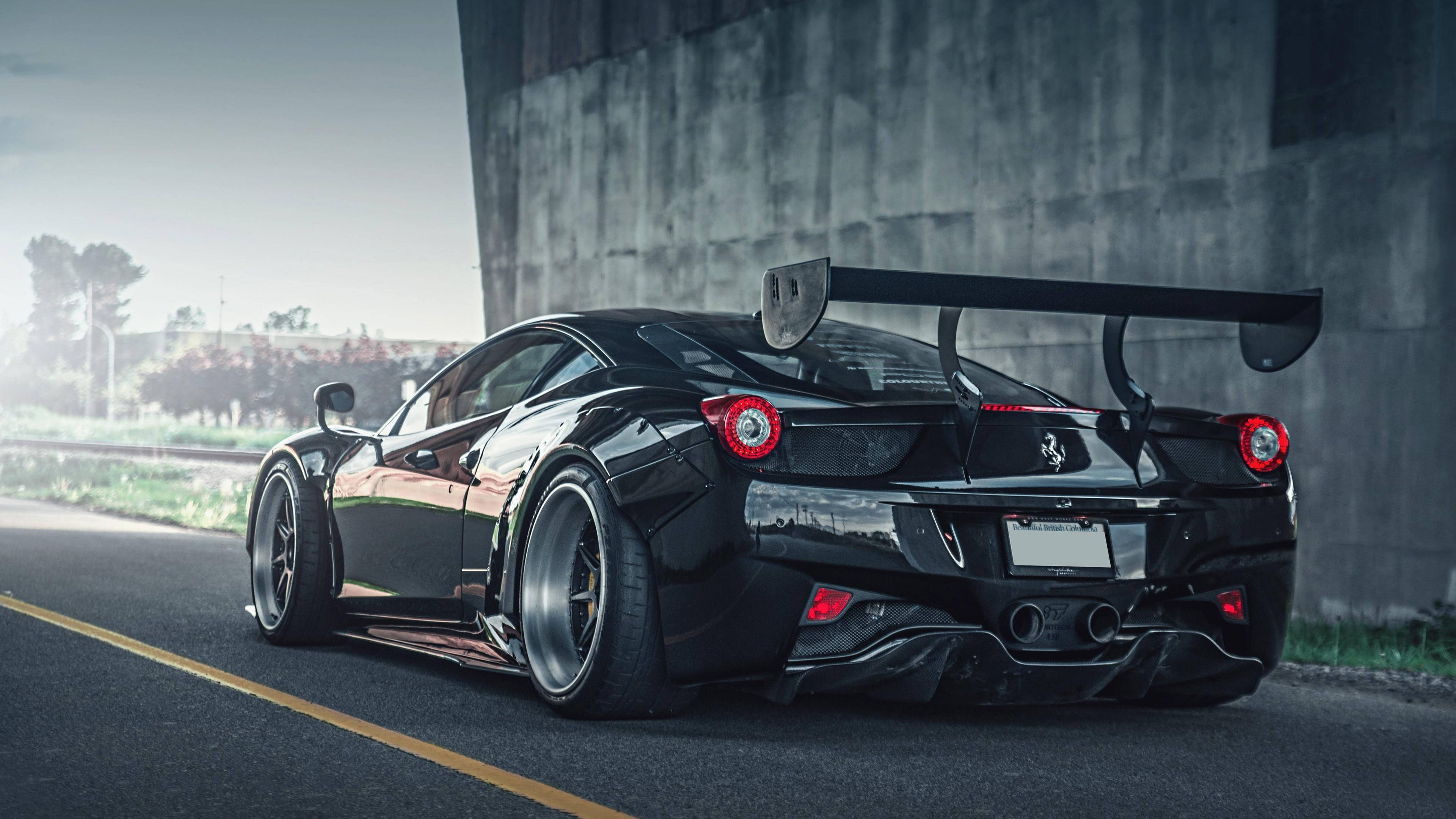Ferrari, glossy black, large rear wing, 4K Desktop Wallpaper