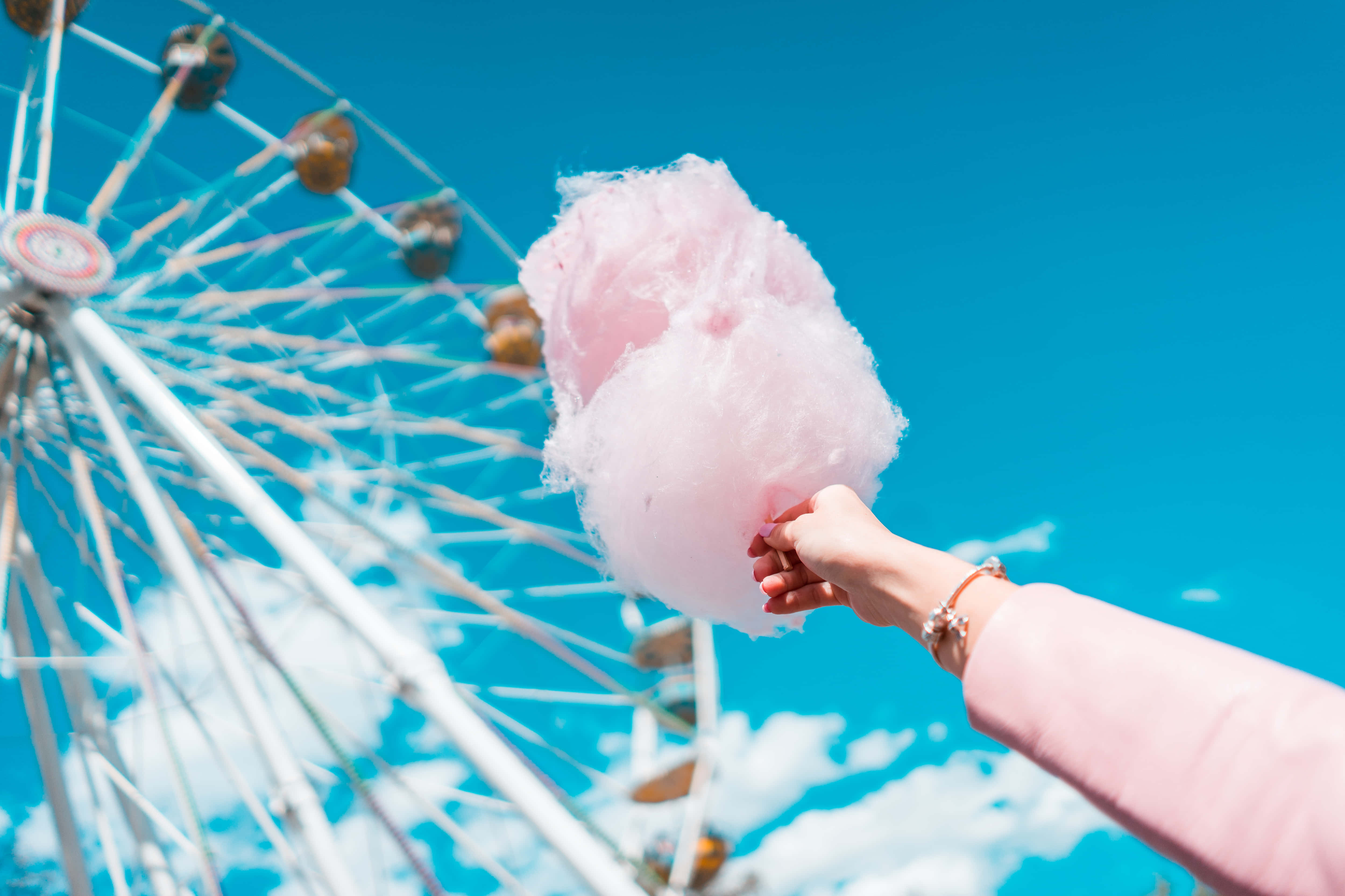 pink cotton candy, bright blue sky, white Ferris wheel, 4K Desktop Wallpaper