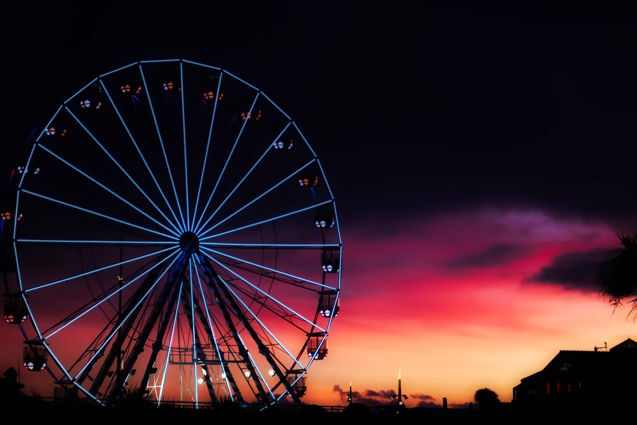 Ferris wheel, glowing blue, fiery sunset sky, Full HD Desktop Wallpaper