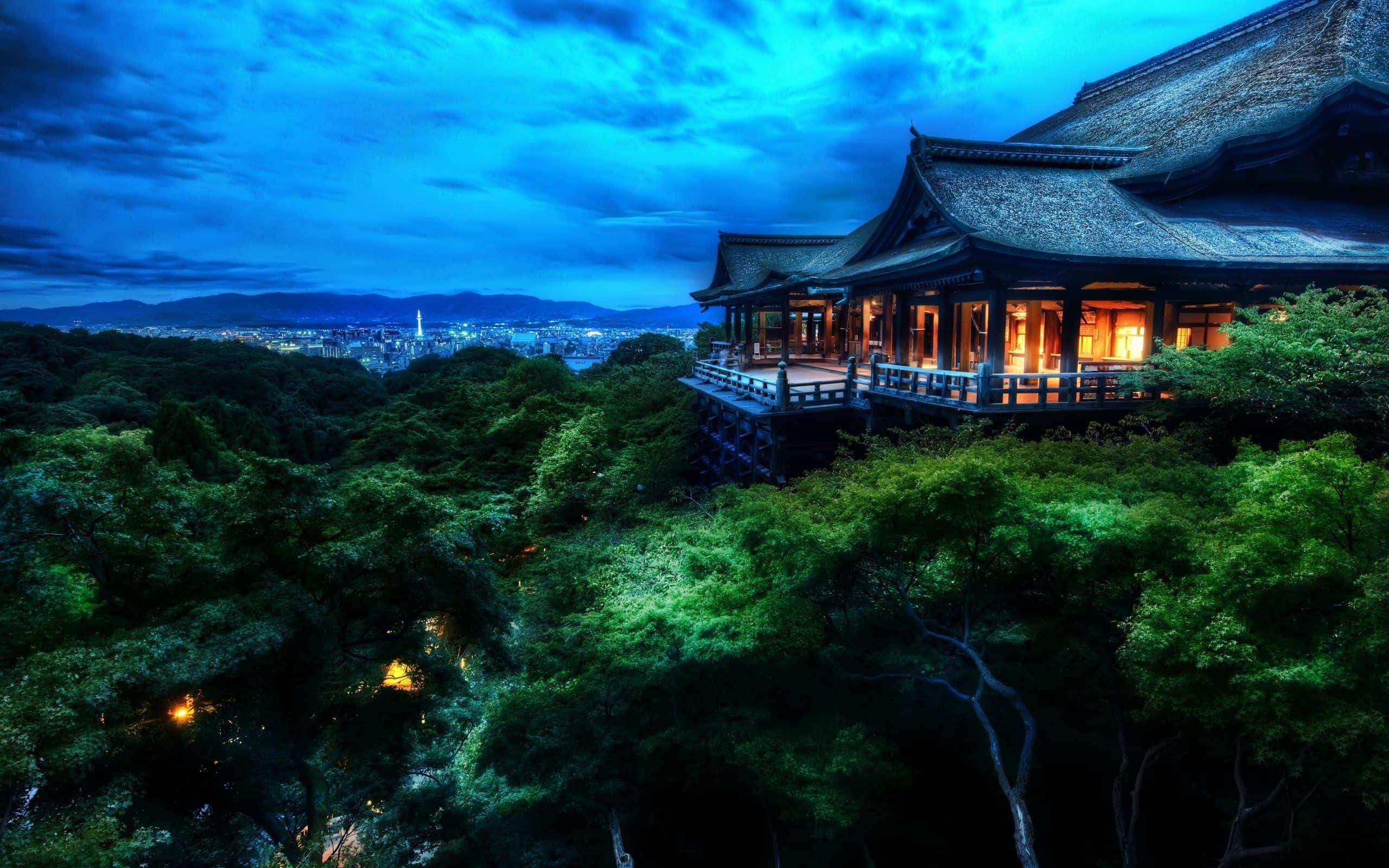 traditional wooden temple, lush green trees, deep blue twilight sky, 2K Desktop Wallpaper