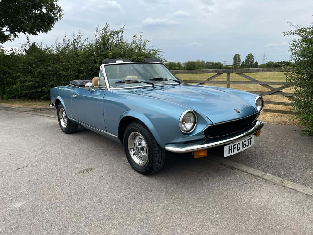 Fiat 124 Spider, light blue, convertible, SD Desktop Wallpaper