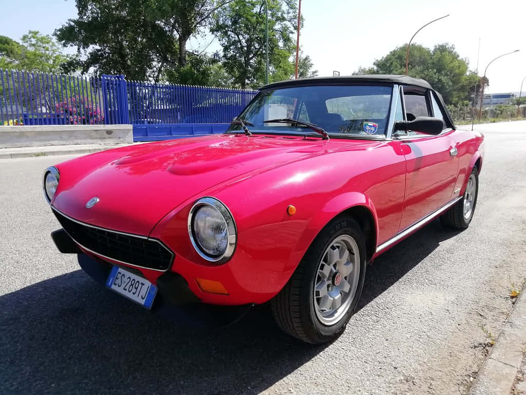 Fiat 124 Spider, vibrant red, sunlit asphalt road, SD Desktop Wallpaper