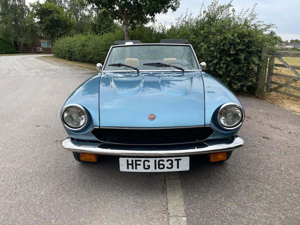 Fiat 124 Spider, light blue, convertible, SD Desktop Wallpaper