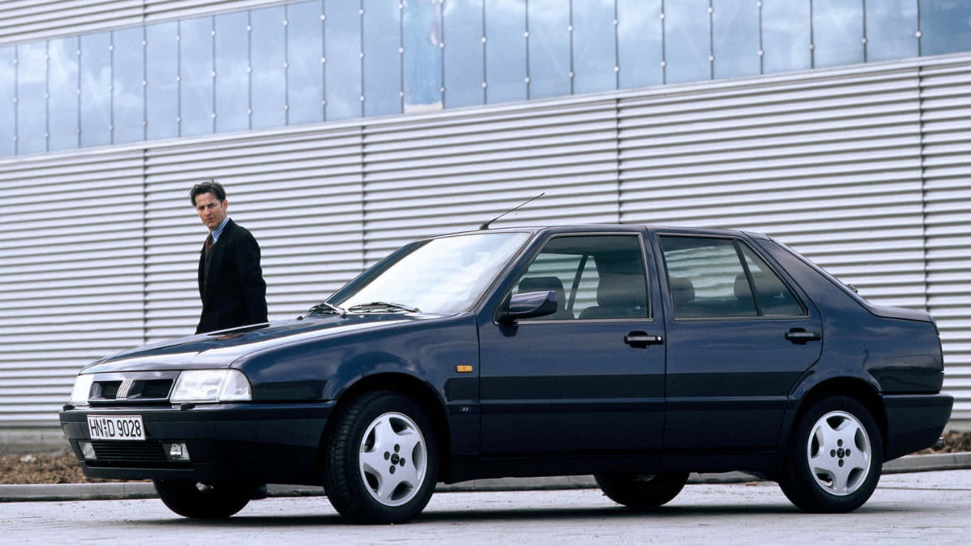Fiat Croma, dark blue sedan, modern corrugated metal building, HD Desktop Wallpaper