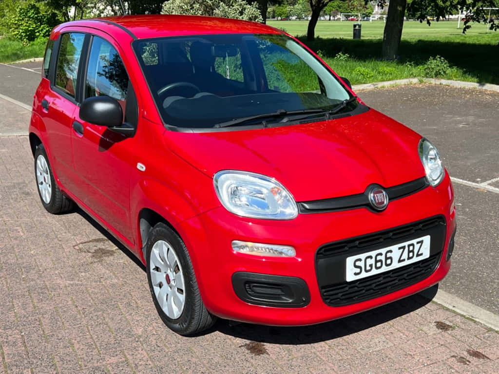 Fiat Panda, vibrant red, brick-paved area, SD Desktop Wallpaper
