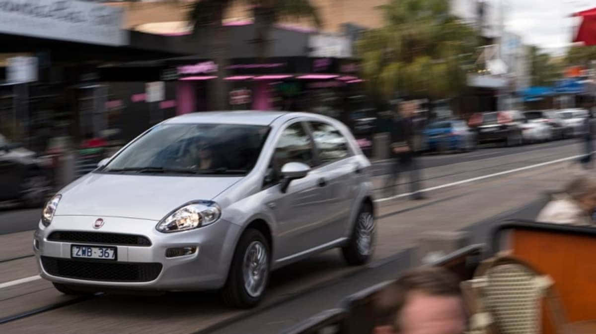 Fiat Punto, silver, bustling city street, SD Desktop Wallpaper