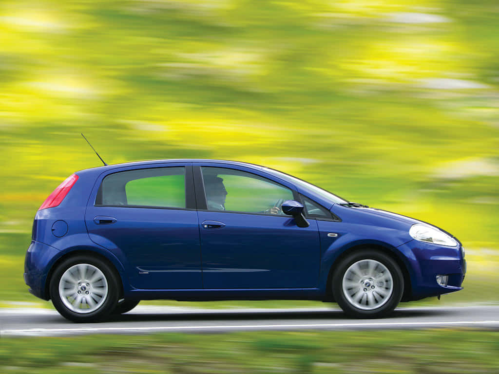 Fiat Punto, blue hatchback, rays of sunlight, SD Desktop Wallpaper