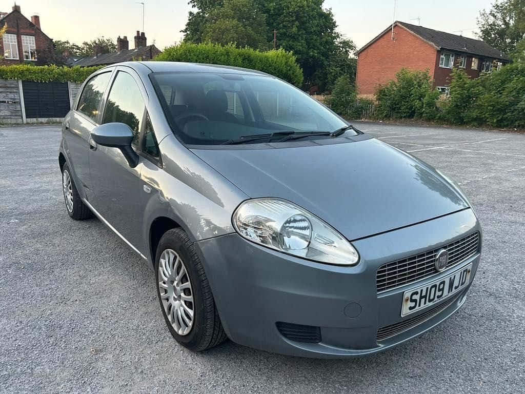 Fiat Punto, gray, gravel lot, SD Desktop Wallpaper