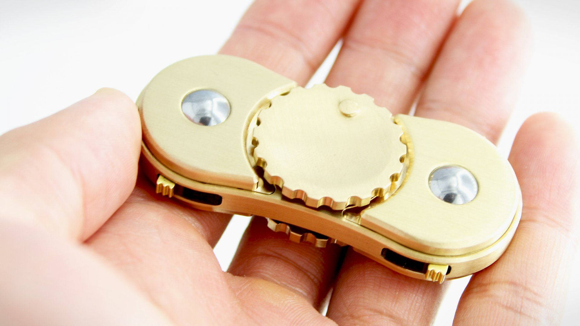 brass fidget spinner, gear-like center, silver bearings, Full HD Desktop Wallpaper