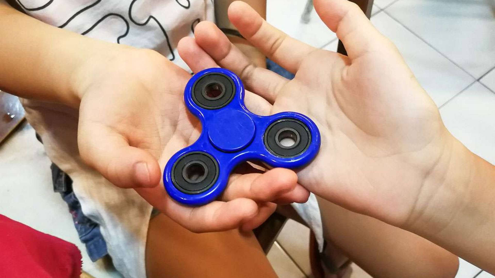 fidget spinner, bright blue, cupped hands, Full HD Desktop Wallpaper