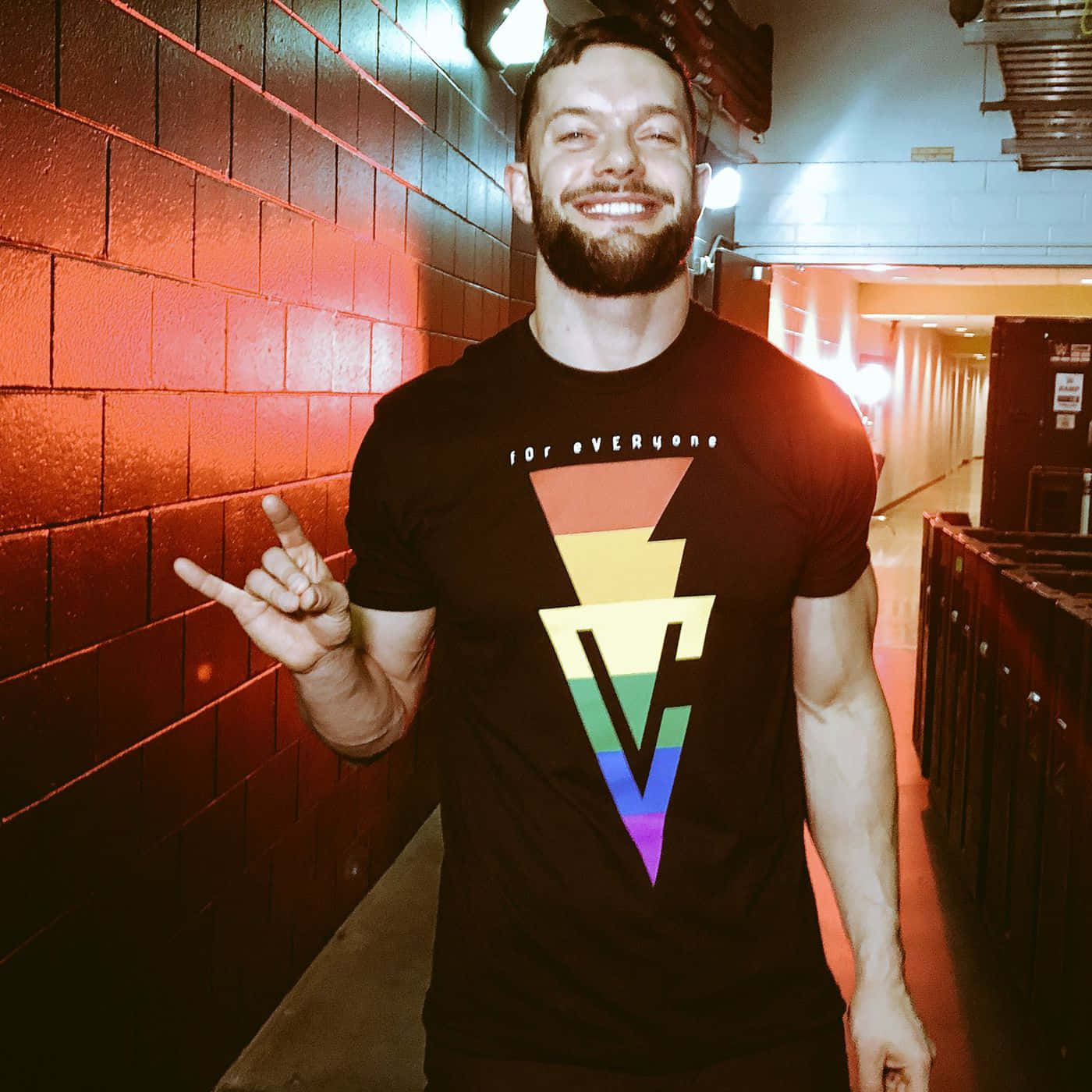Finn Balor, rainbow lightning bolt t-shirt, red-lit brick hallway, HD Desktop Wallpaper