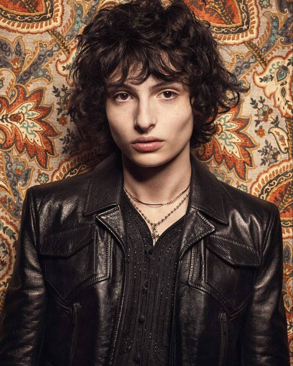 Finn Wolfhard, black leather jacket, curly dark hair, SD Phone Wallpaper