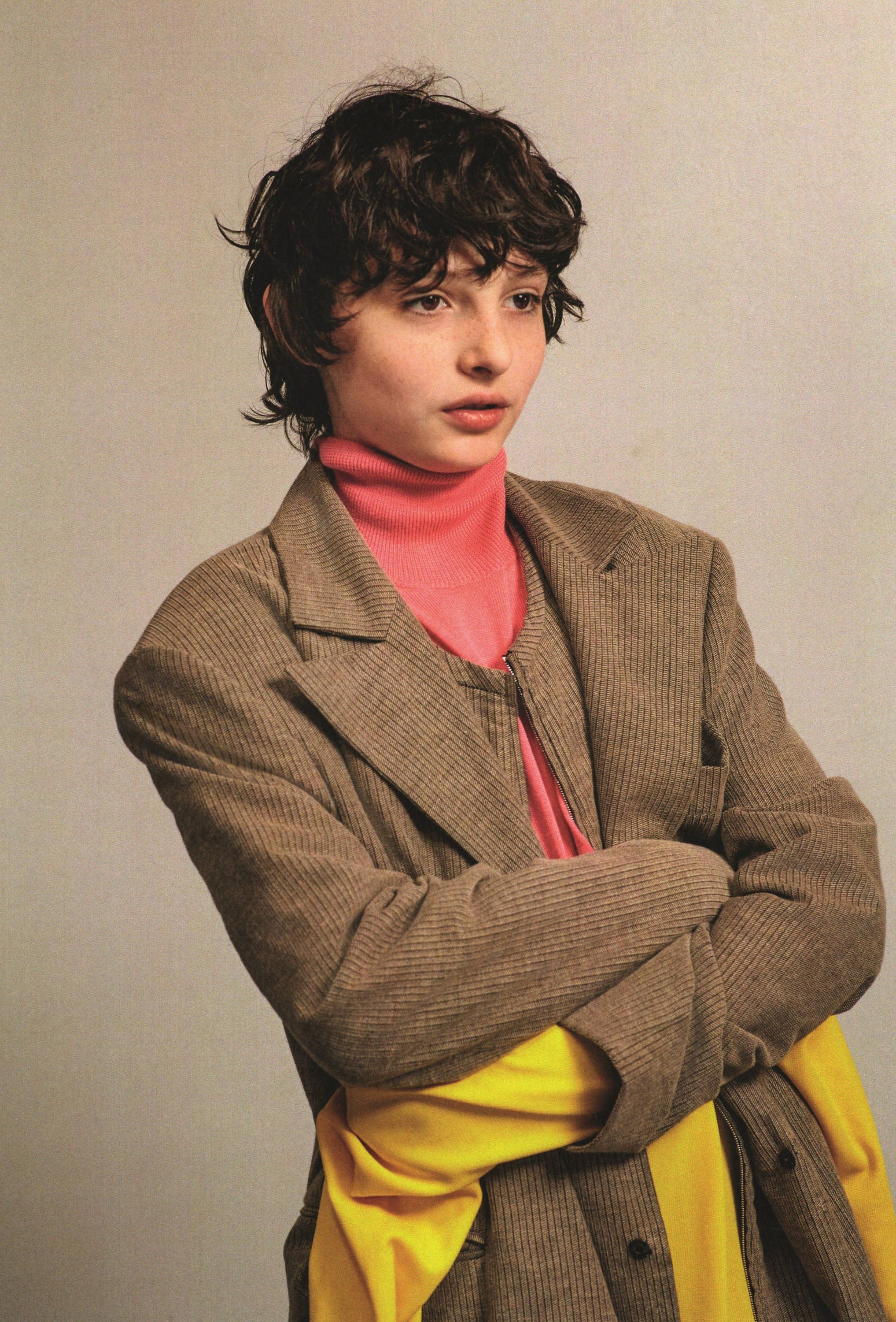 Finn Wolfhard, curly dark hair, brown corduroy blazer, 2K Phone Wallpaper