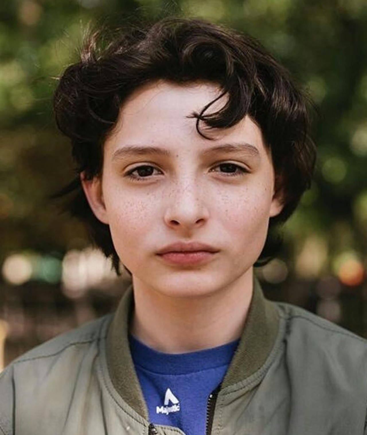 Finn Wolfhard, short hair, green jacket, HD Phone Wallpaper