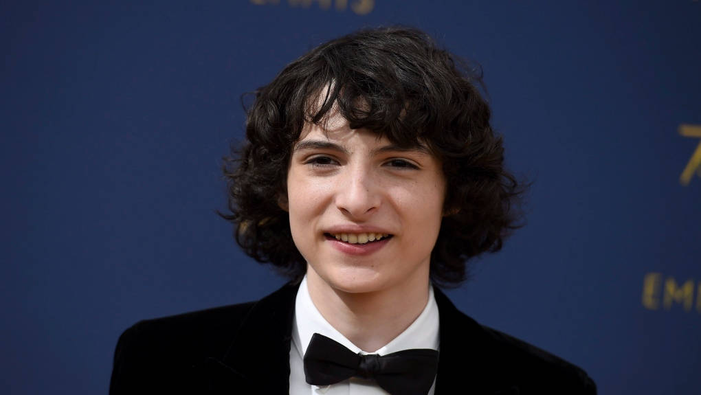 Finn Wolfhard, curly dark hair, black tuxedo, SD Desktop Wallpaper