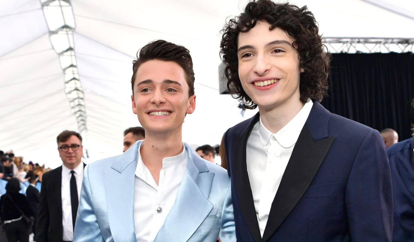 Finn Wolfhard, stylish suits, bright outdoor event, HD Desktop Wallpaper