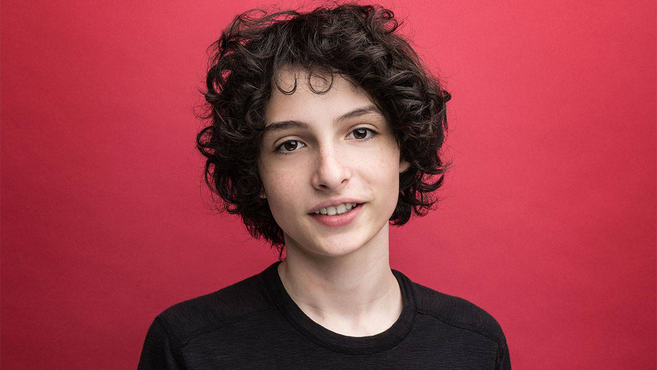 Finn Wolfhard, curly dark hair, smiling, HD Desktop Wallpaper