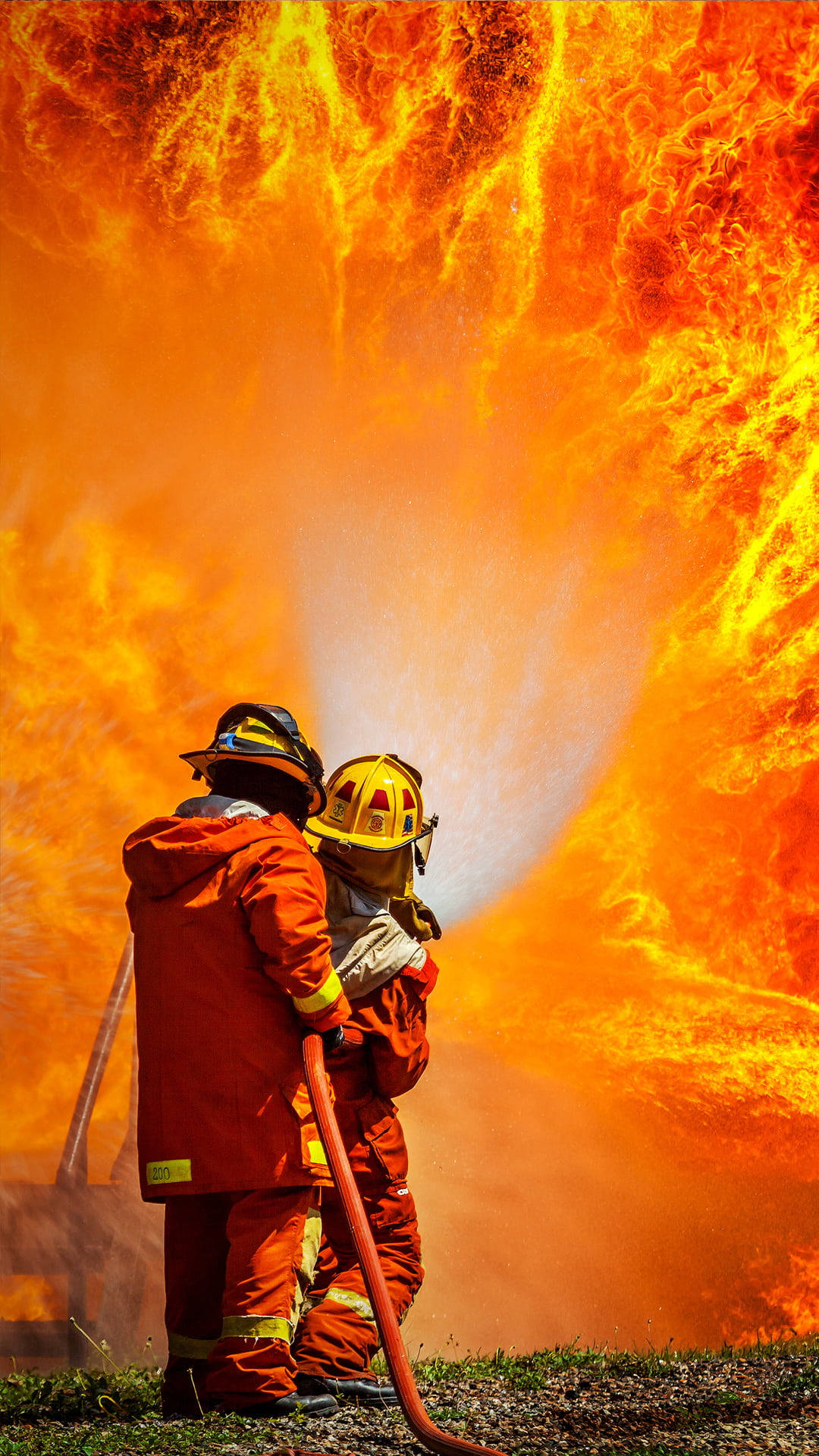 firefighters, orange gear, towering wall of roaring orange flames, Full HD Phone Wallpaper