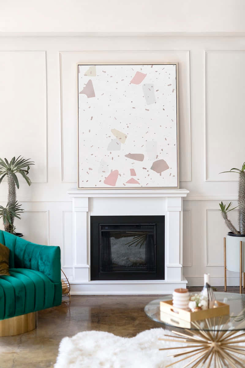 white fireplace, terrazzo art piece, green velvet chair, SD Phone Wallpaper