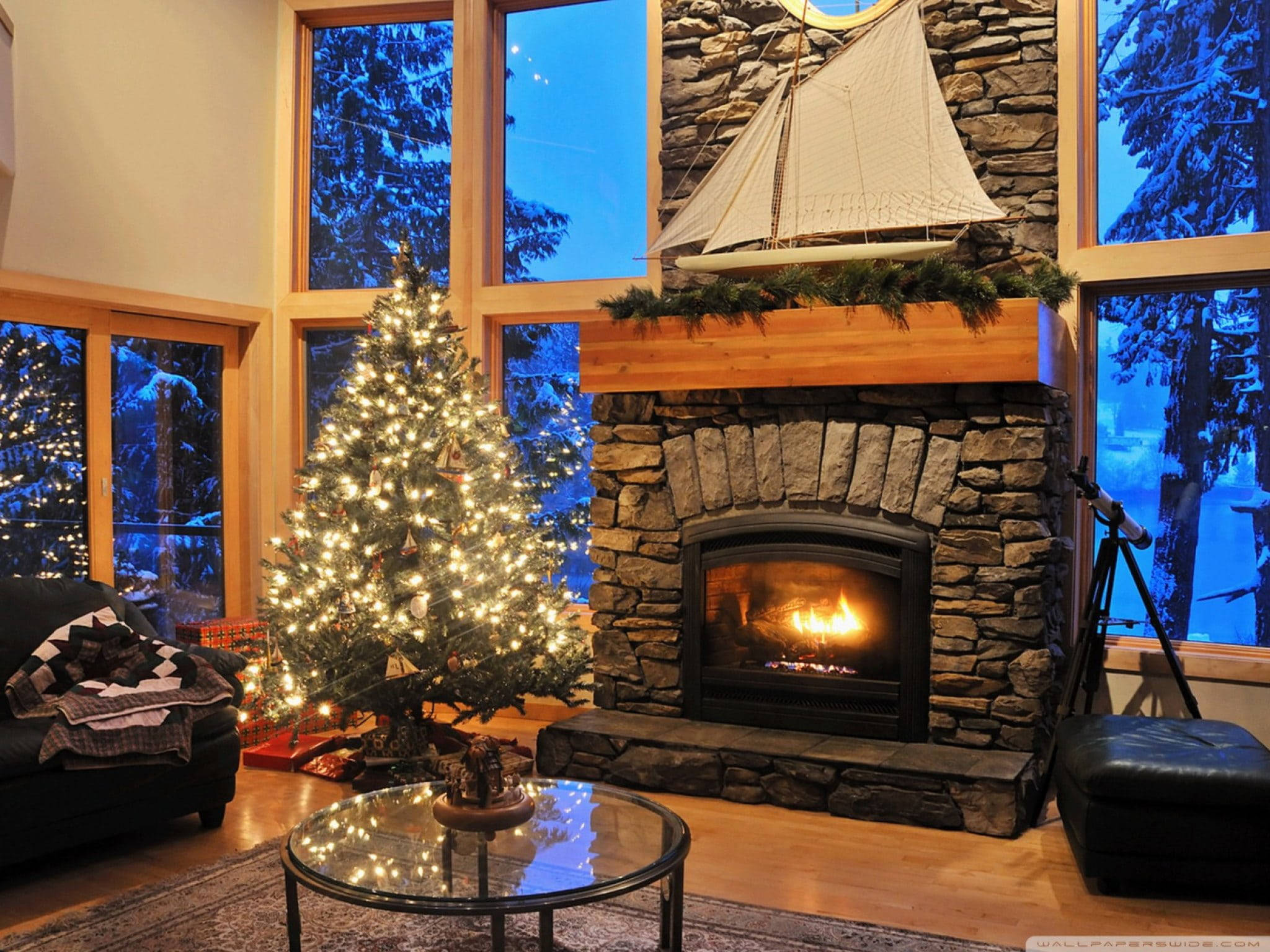 stone fireplace, lit Christmas tree, snowy forest view, Full HD Desktop Wallpaper