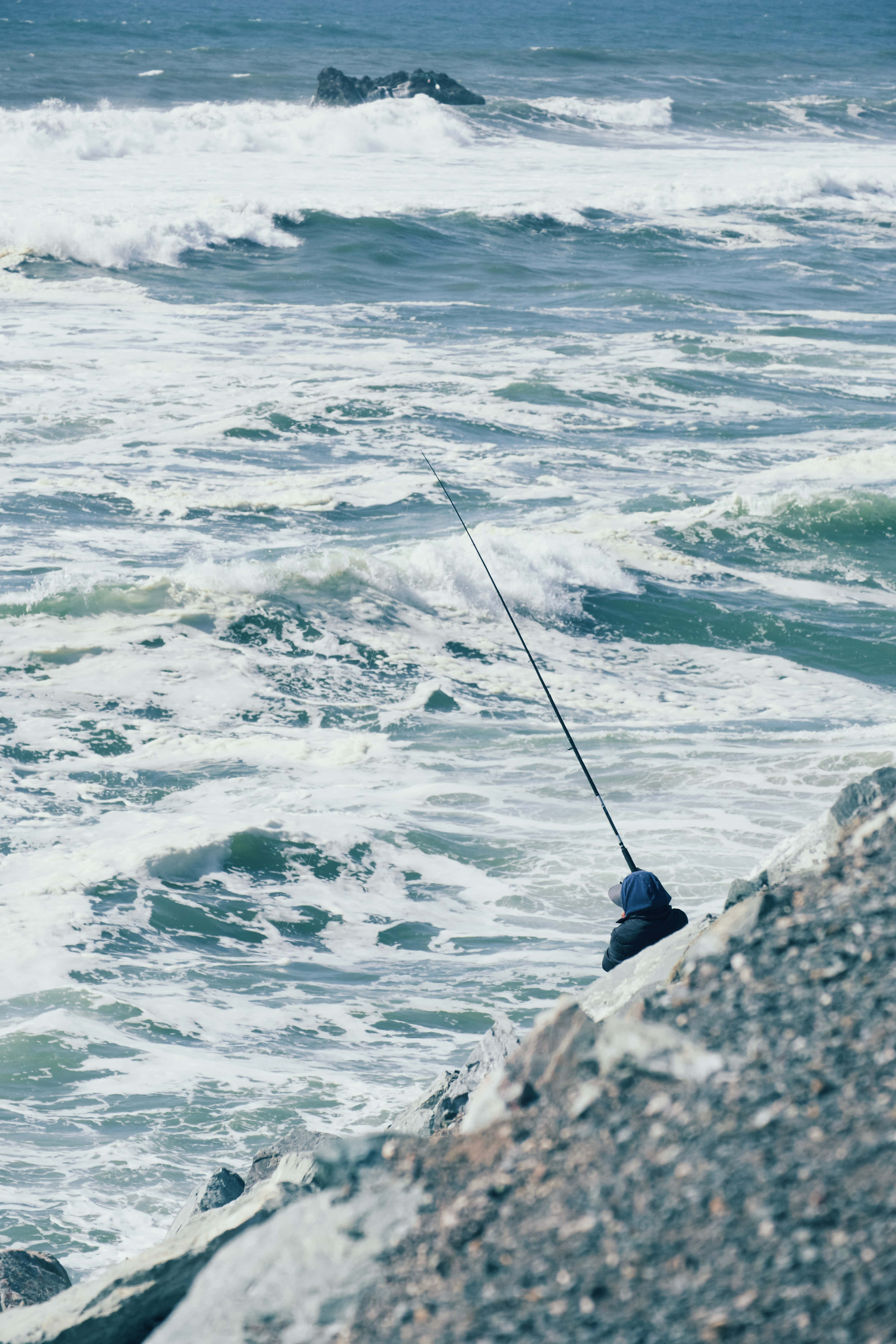 fishing phone, cliff edge, ocean waves, 5K Phone Wallpaper