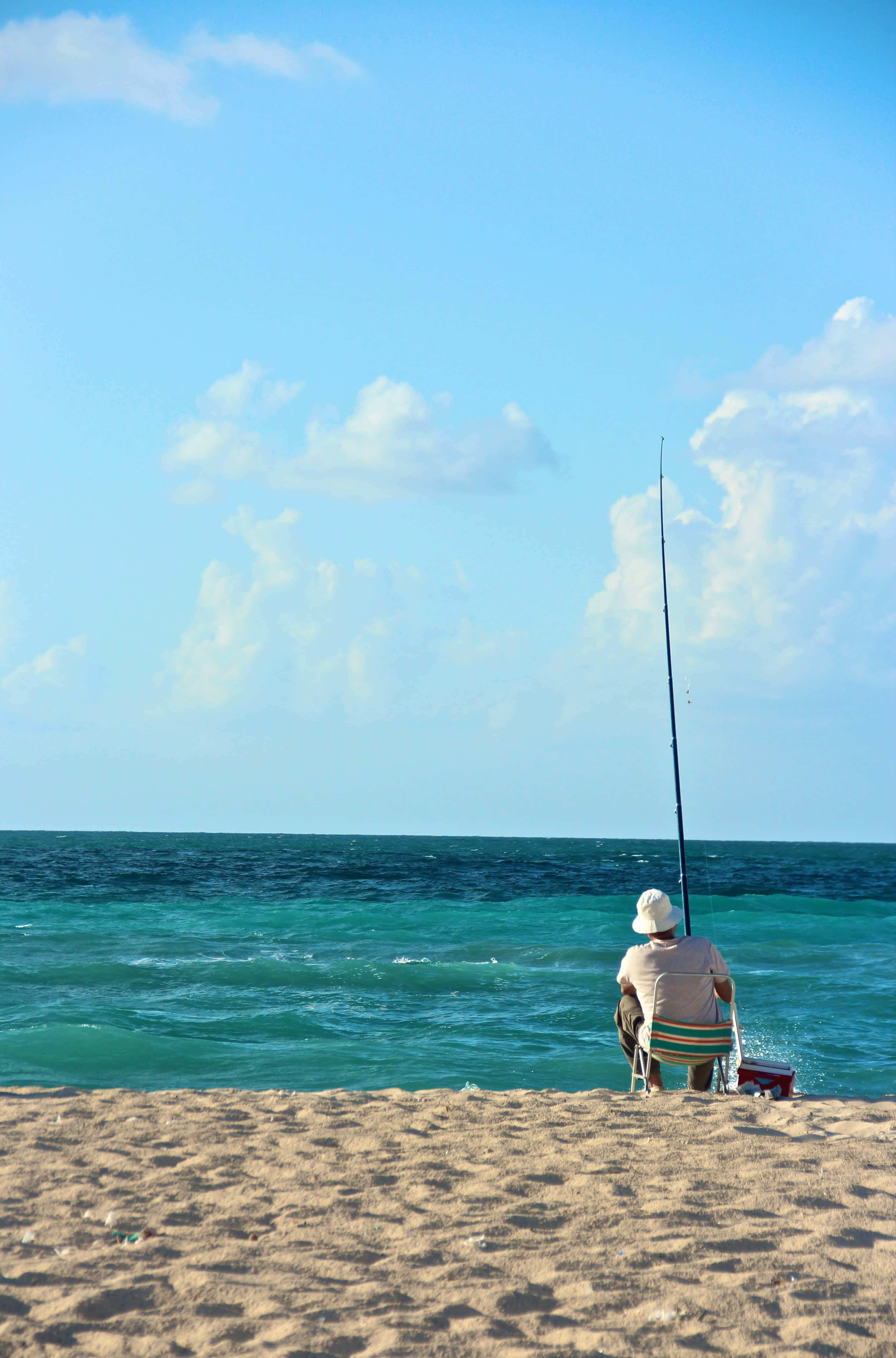 Fishing Phone, sandy beach, turquoise ocean, 4K Phone Wallpaper