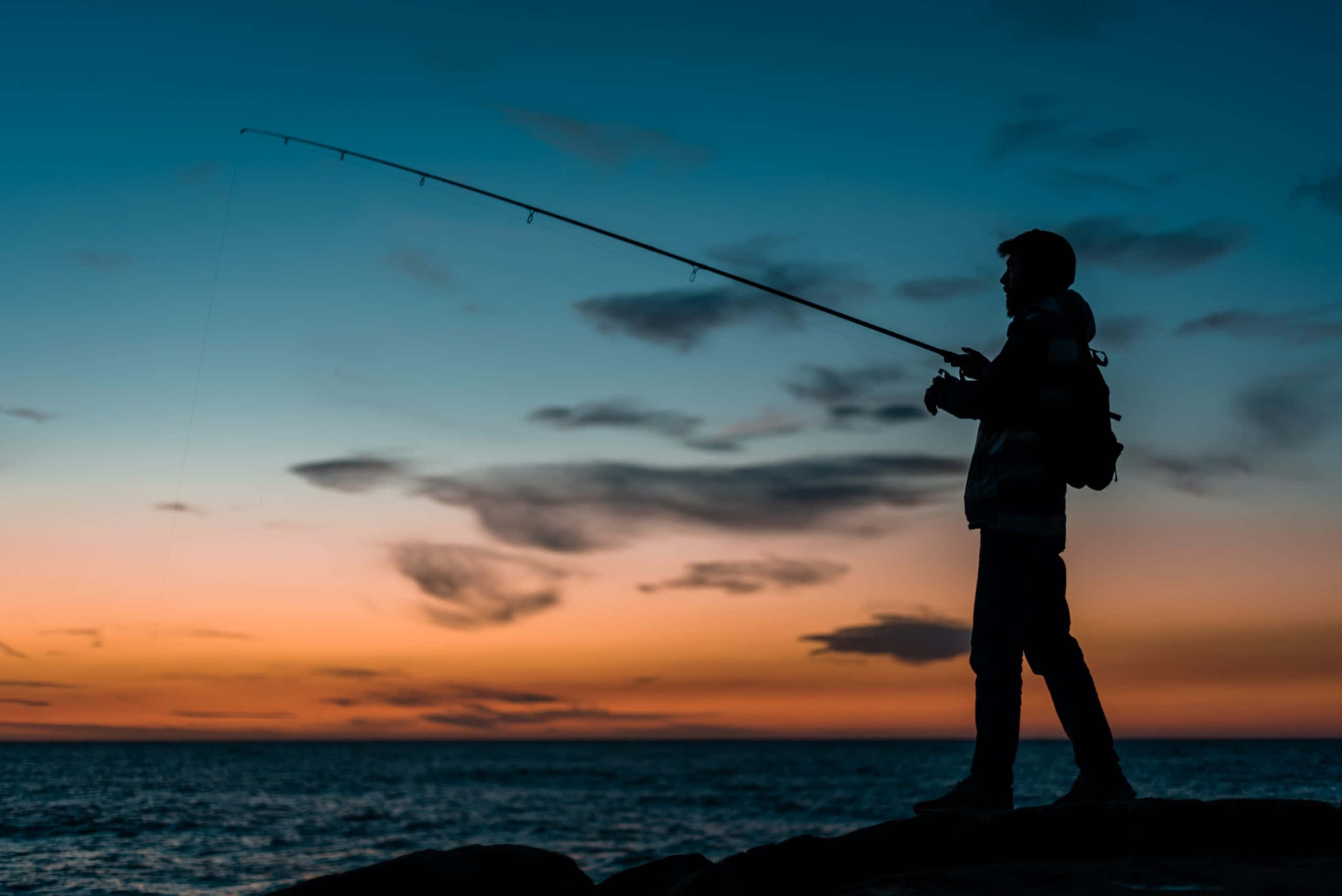 fishing rod, rocky shore, twilight, 2K Desktop Wallpaper