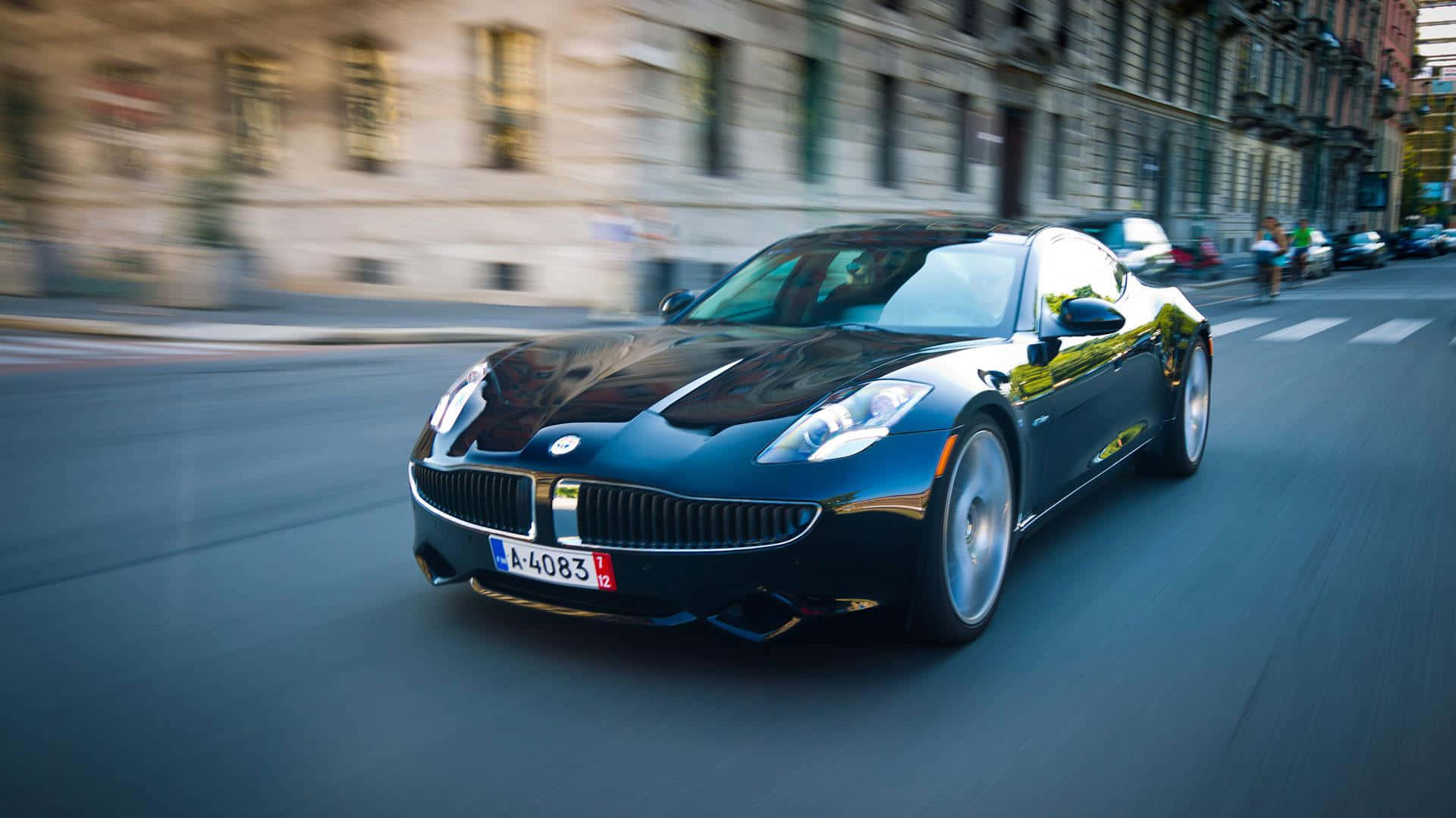 Fisker, sleek black sports car, vibrant sunset, Full HD Desktop Wallpaper