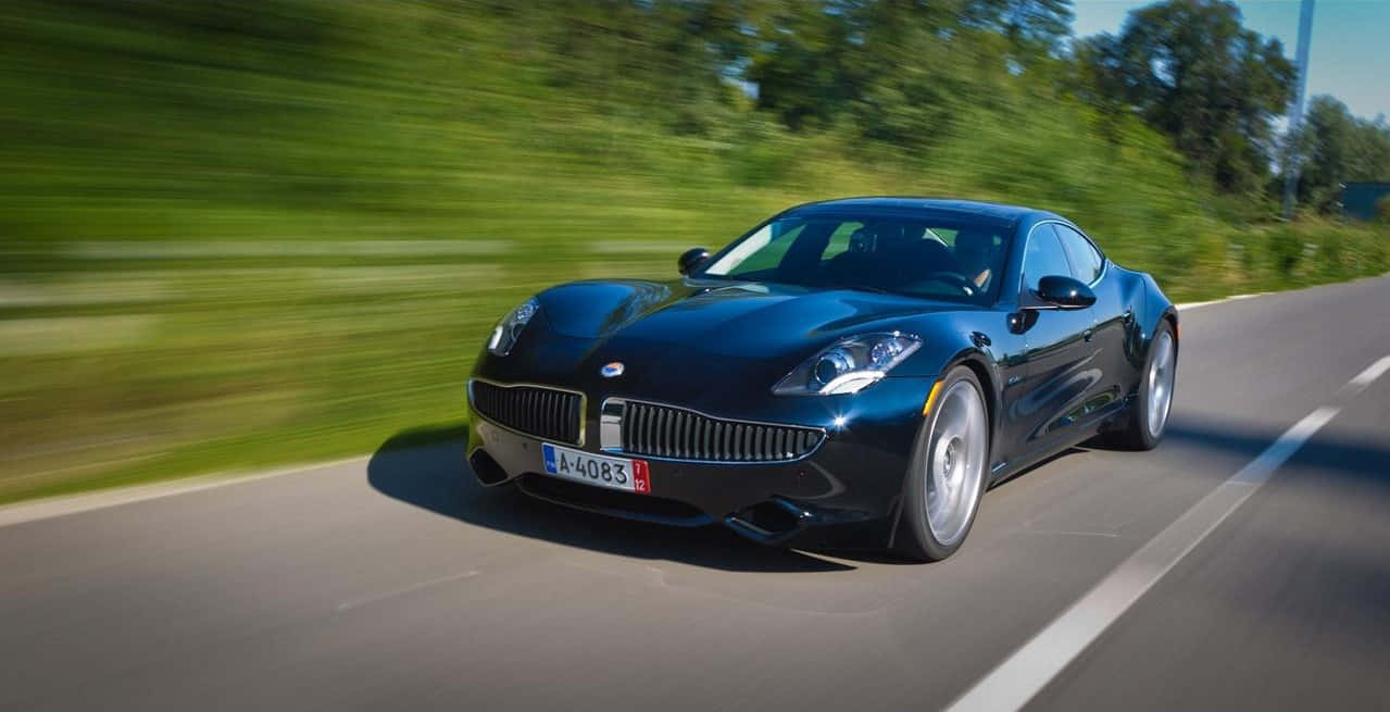Fisker, sleek black sports car, sunlit road, SD Desktop Wallpaper