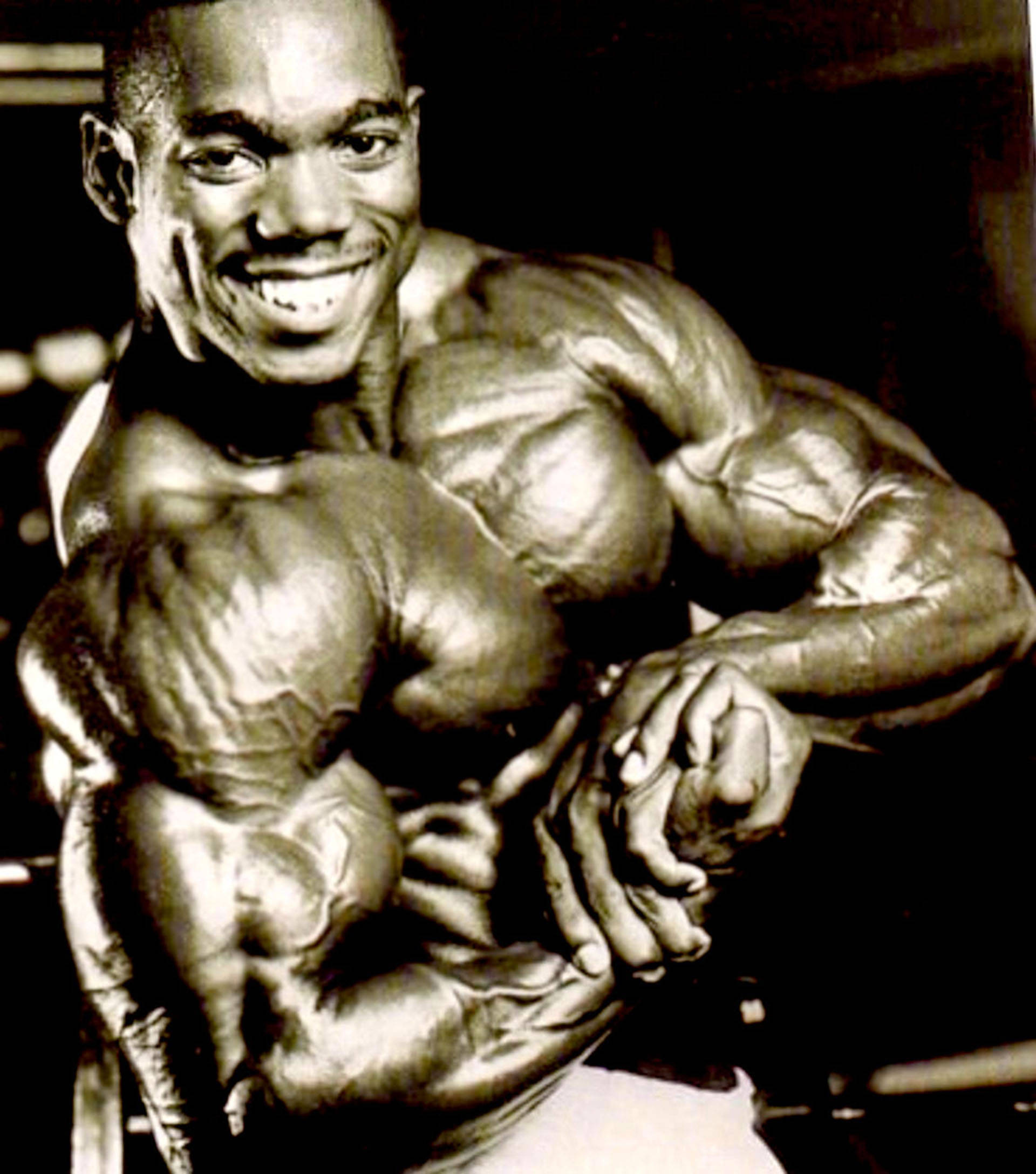 Flex Wheeler, side chest pose, muscular man, Full HD Phone Wallpaper