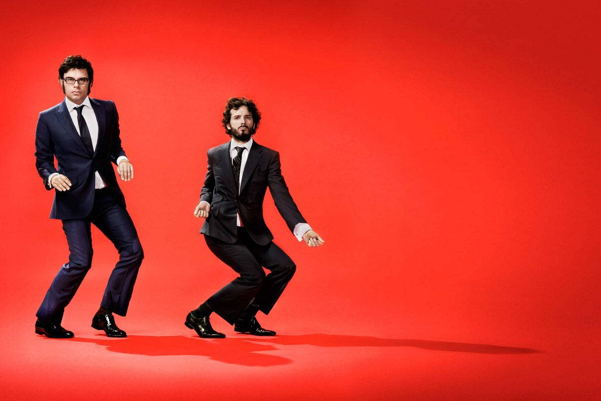 Flight Of The Conchords, sharp suits, bold red studio backdrop, SD Desktop Wallpaper