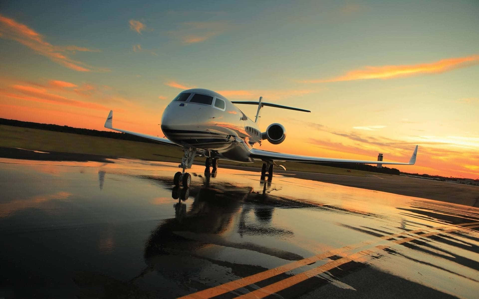 private jet, wet runway, fiery sunset hues, Full HD Desktop Wallpaper