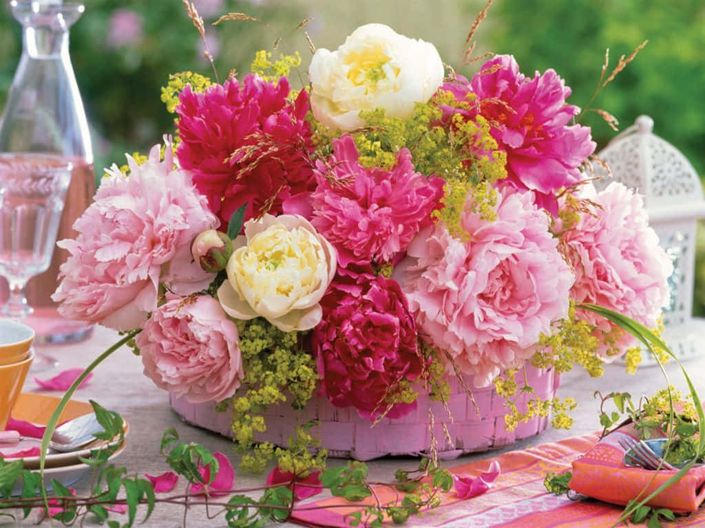 pink woven basket, sunlit outdoor table, vibrant bouquet, SD Desktop Wallpaper