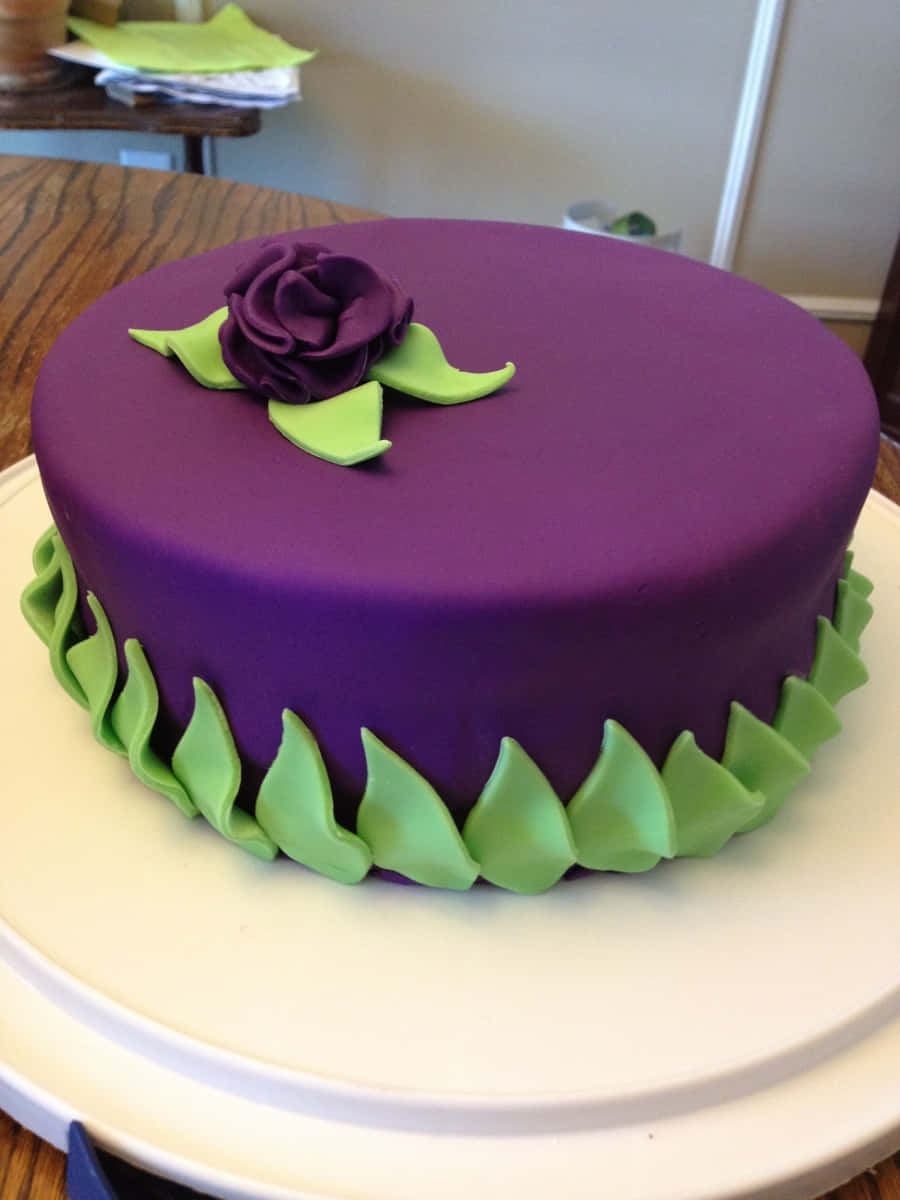 purple cake, dark purple fondant rose, lime green leaf accents, SD Phone Wallpaper